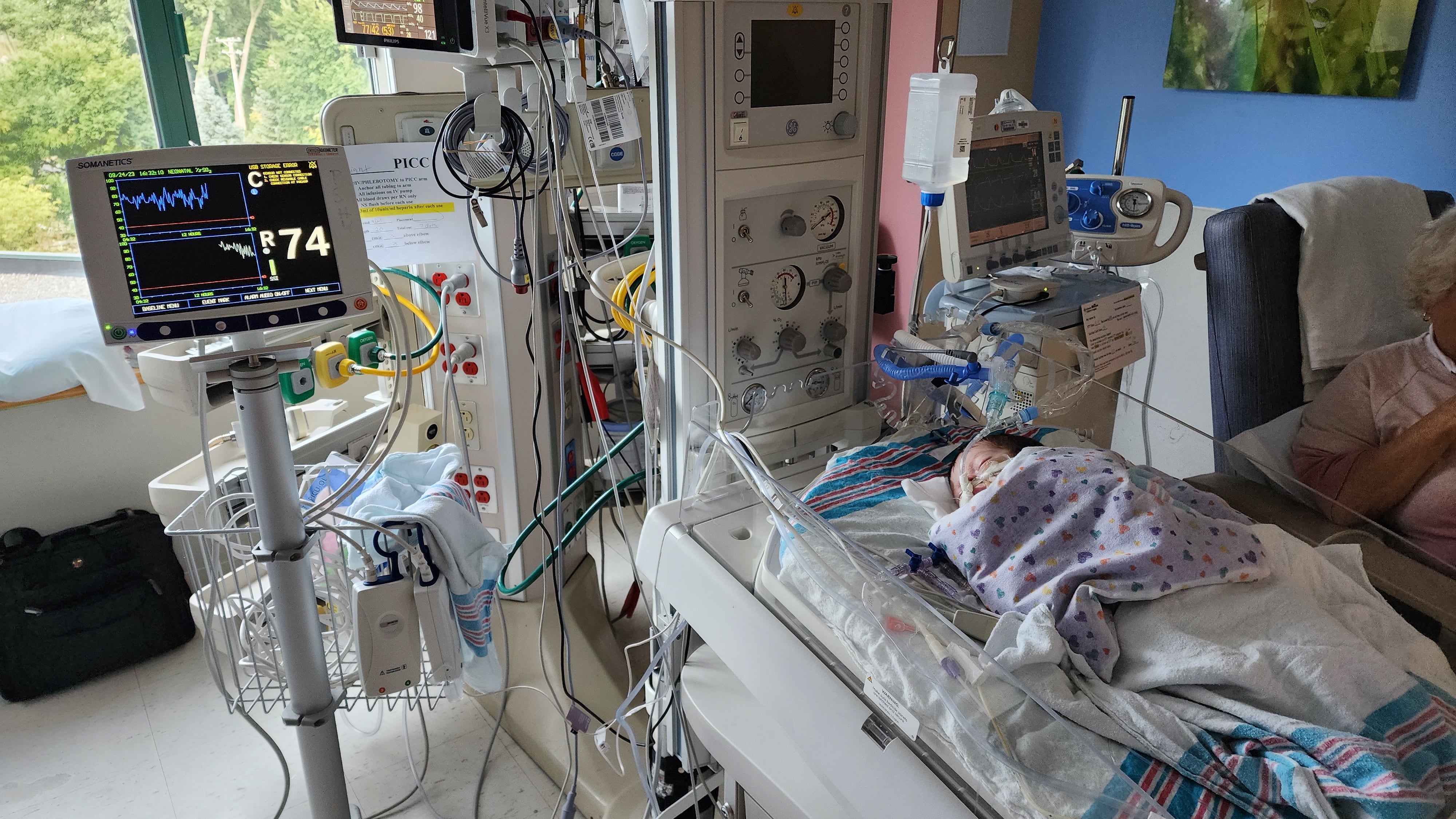 Father with daughter — Metra Chicago fired him while she was in critical care