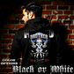 Model wearing gothic angel graphic oversized hoodie with dark art design. 