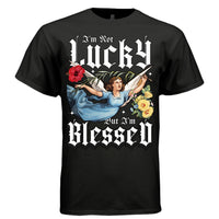 Black im not lucky but im blessed t-shirt front view bold Gothic LUCKY BLESSED text with flying angel floral graphic